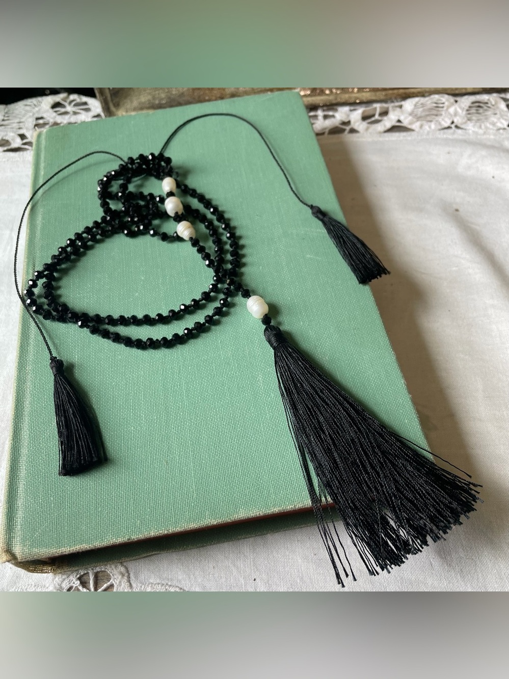Adjustable black glass pearl tassel necklace